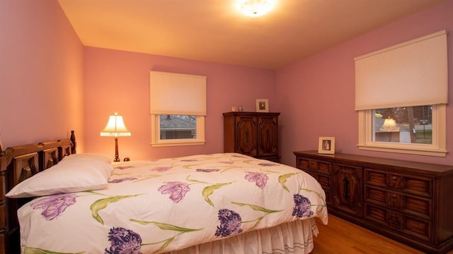 bedroom featuring wood finished floors