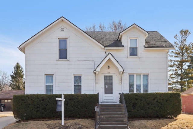 view of front of house featuring roof with shingles