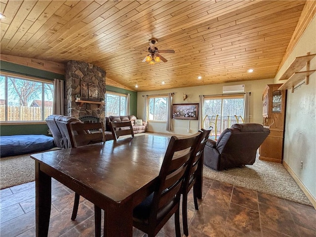 dining space featuring baseboards, wood ceiling, a wall unit AC, and a ceiling fan