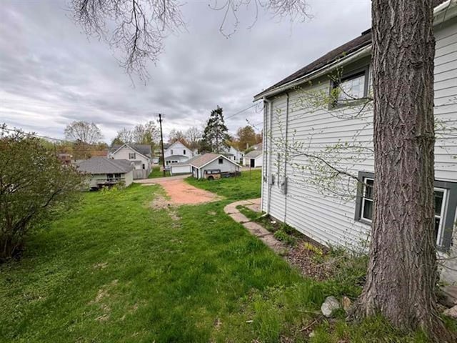 view of yard featuring a residential view