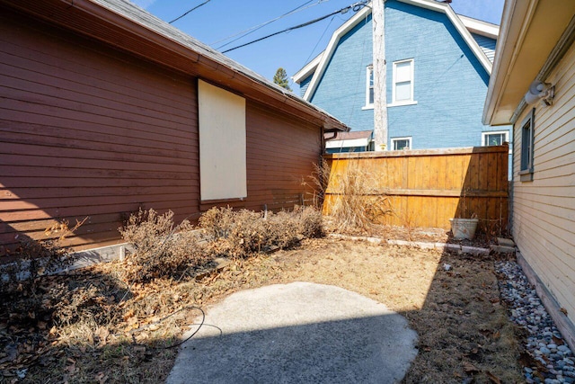 view of yard with a patio and fence