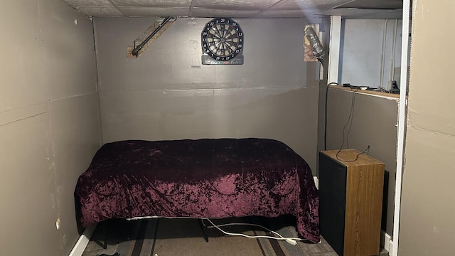 bedroom with a paneled ceiling