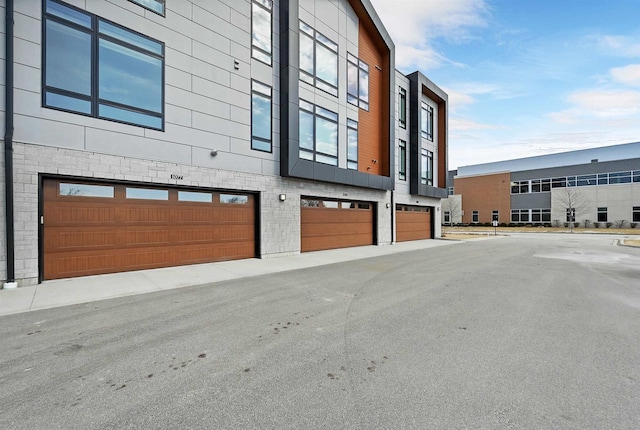 view of building exterior with a garage