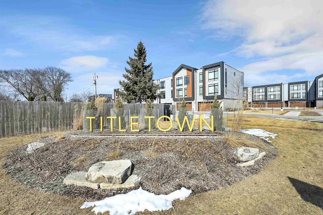 view of property's community with fence