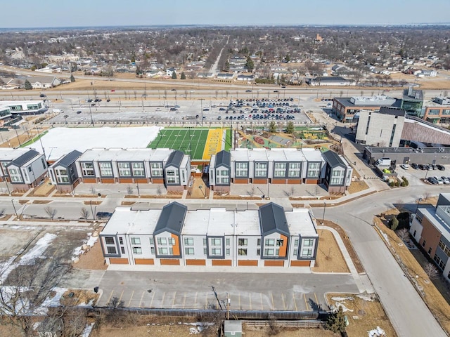 birds eye view of property with a residential view