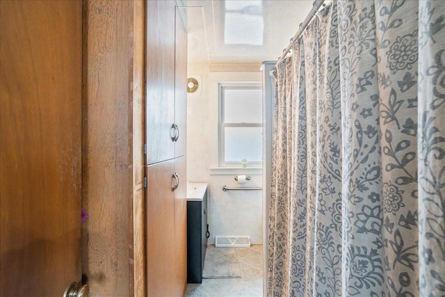 bathroom with tile patterned floors, visible vents, vanity, and a shower with curtain