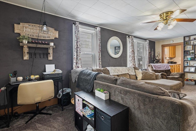 living room with carpet and ceiling fan