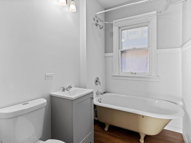 full bathroom featuring wood finished floors, toilet, walk in shower, and a bath