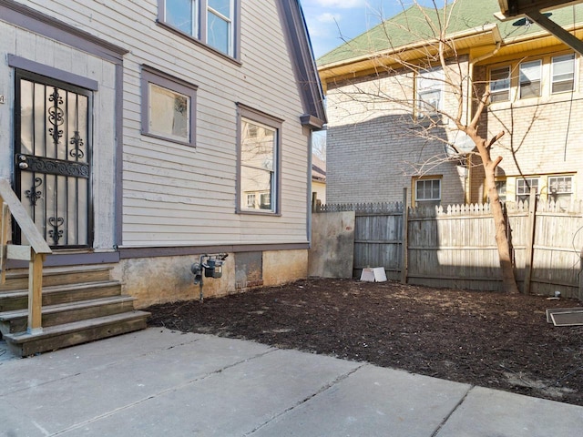 view of side of property with fence