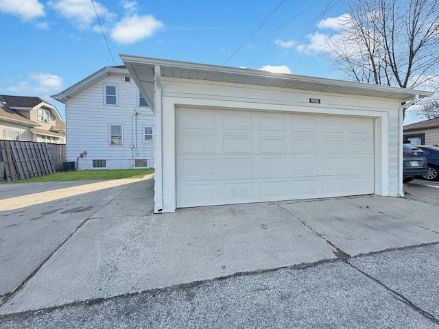 garage with fence