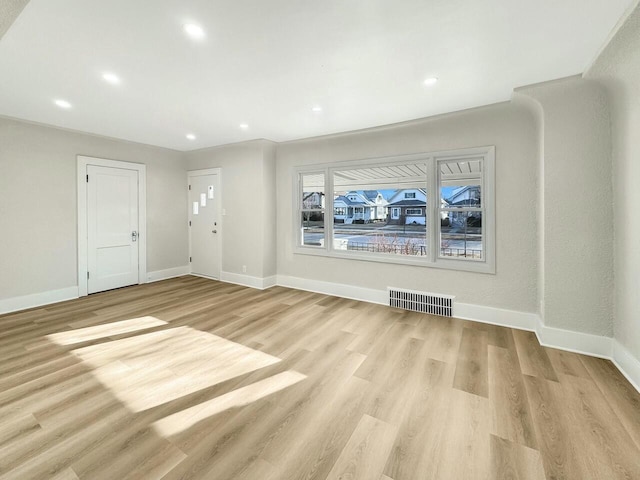 empty room with recessed lighting, visible vents, baseboards, and light wood-style flooring