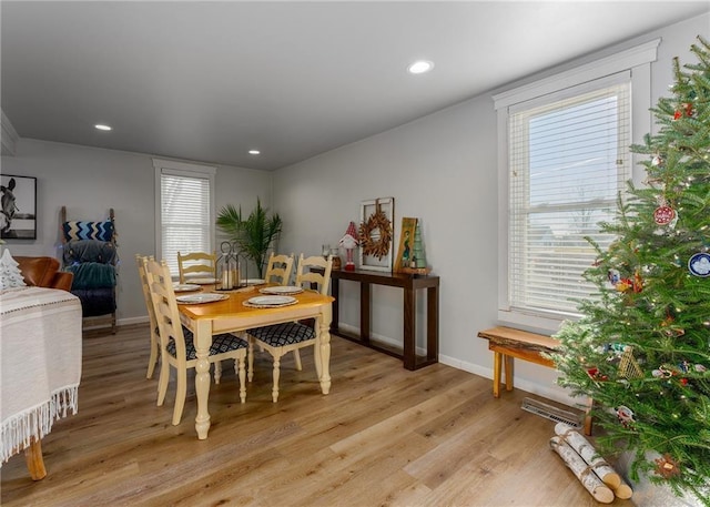 dining area featuring visible vents, recessed lighting, light wood-type flooring, and baseboards