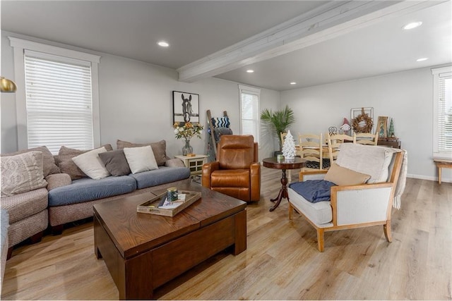 living room featuring beam ceiling, recessed lighting, light wood-type flooring, and baseboards