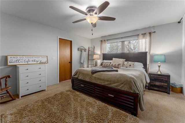 bedroom with carpet and a ceiling fan