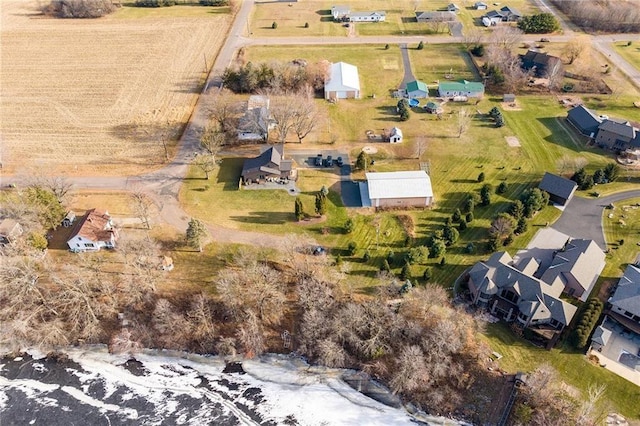 drone / aerial view with a residential view and a rural view