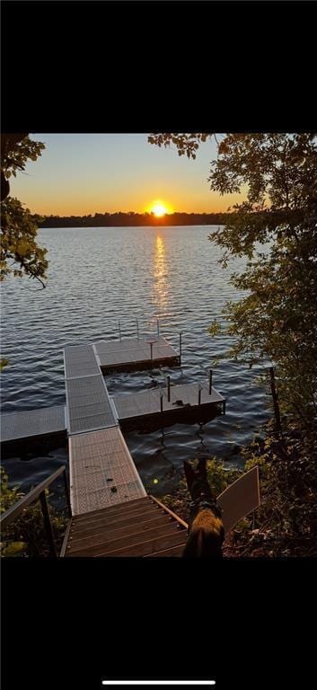 dock area featuring a water view