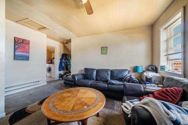 living room featuring visible vents, washing machine and dryer, attic access, carpet flooring, and a baseboard radiator