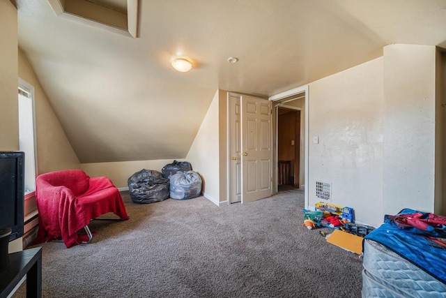 playroom featuring baseboards, carpet floors, baseboard heating, and lofted ceiling