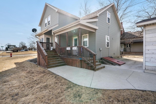 view of front of property featuring covered porch