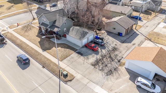 birds eye view of property with a residential view