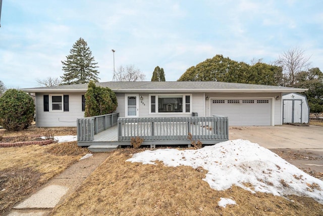 ranch-style home with an attached garage and concrete driveway