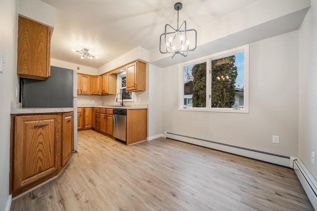 kitchen with a notable chandelier, brown cabinets, dishwasher, and a baseboard heating unit