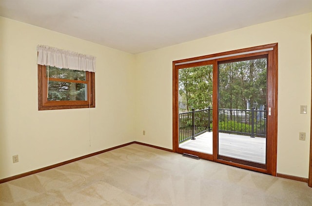 2325 Stuart Ct, Madison, WI 53704 - unfurnished room with baseboards, carpet floors, and visible vents