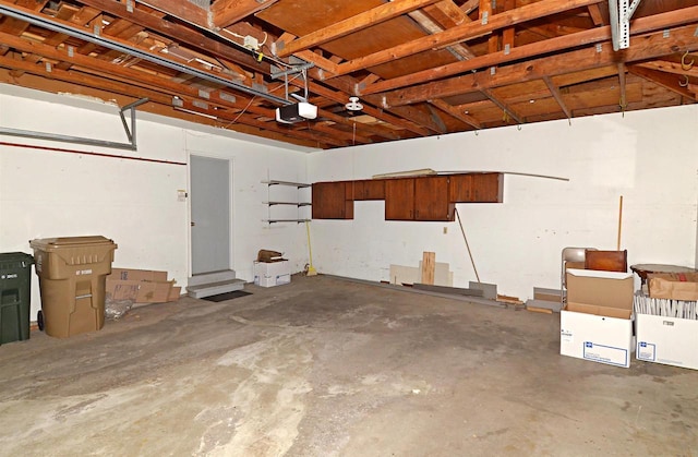 2325 Stuart Ct, Madison, WI 53704 - garage featuring a garage door opener