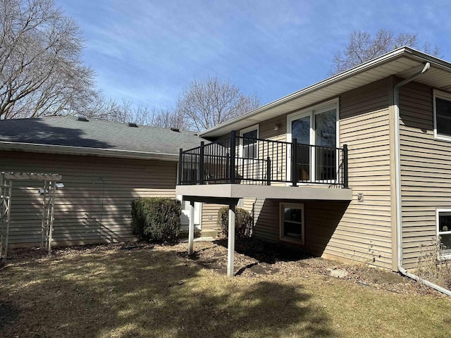 2325 Stuart Ct, Madison, WI 53704 - rear view of house featuring roof with shingles