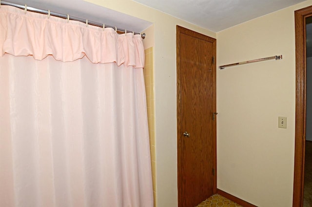 2325 Stuart Ct, Madison, WI 53704 - full bath featuring a shower with shower curtain