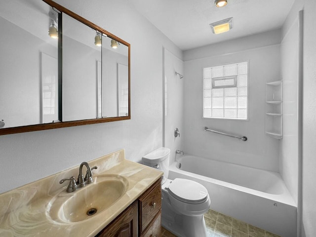 bathroom with vanity, toilet, visible vents, and shower / washtub combination