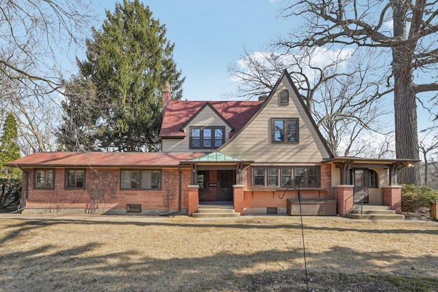 view of front of house featuring brick siding