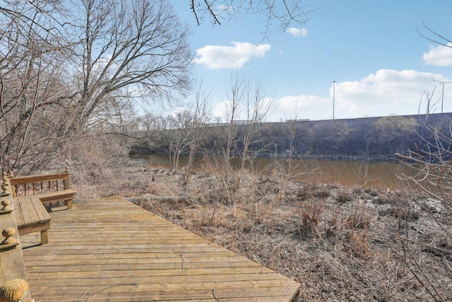 view of dock with a water view