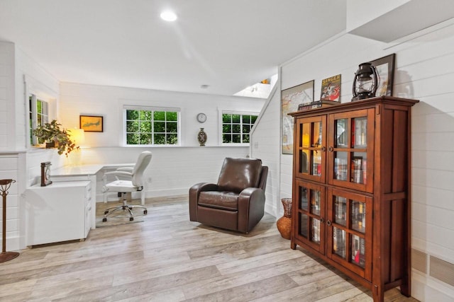 office space with light wood-style floors