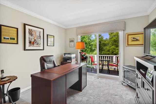 office area with baseboards, carpet, visible vents, and ornamental molding