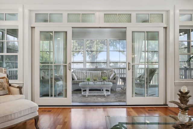 entryway with visible vents and wood finished floors