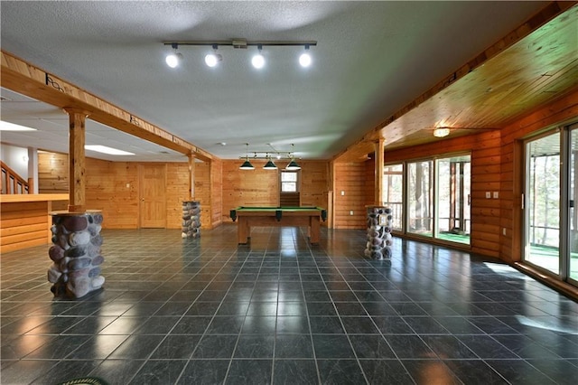 rec room featuring tile patterned flooring, billiards, wood walls, and ornate columns