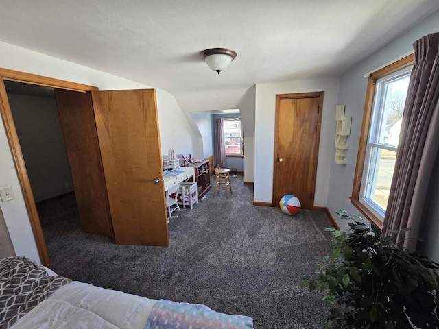 carpeted bedroom with baseboards