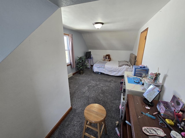 carpeted bedroom featuring lofted ceiling and baseboards