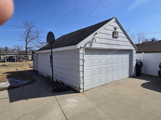 detached garage with fence