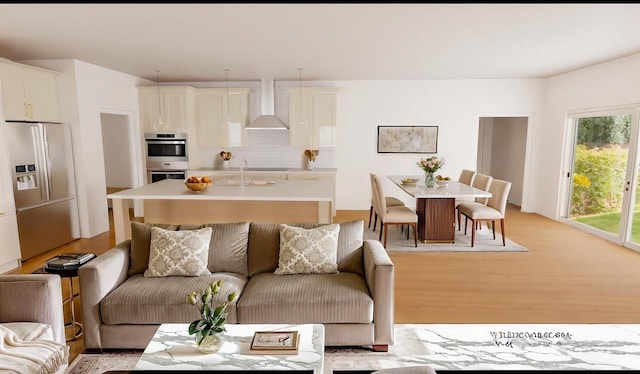 living area with light wood-style floors