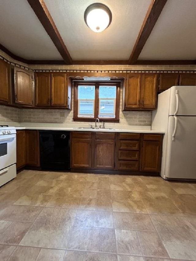 kitchen with backsplash, beamed ceiling, light countertops, white appliances, and a sink