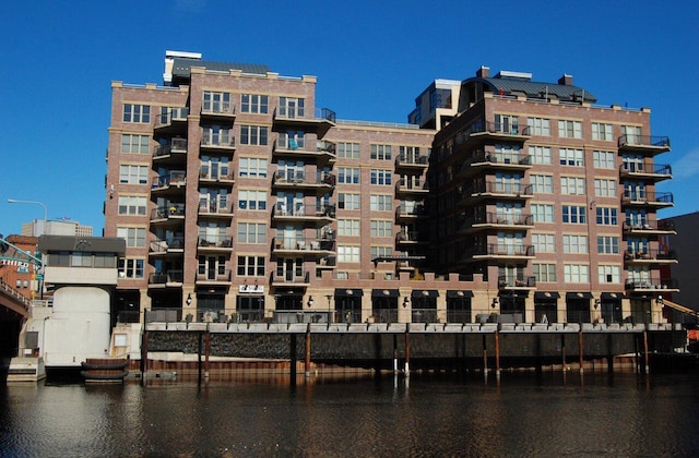 view of building exterior featuring a water view