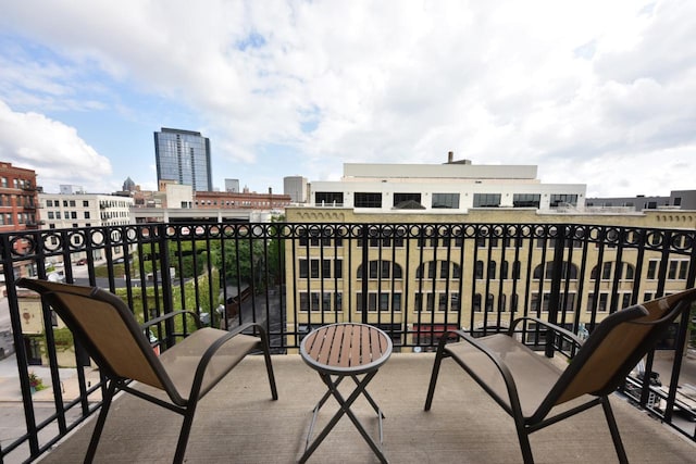 balcony featuring a view of city