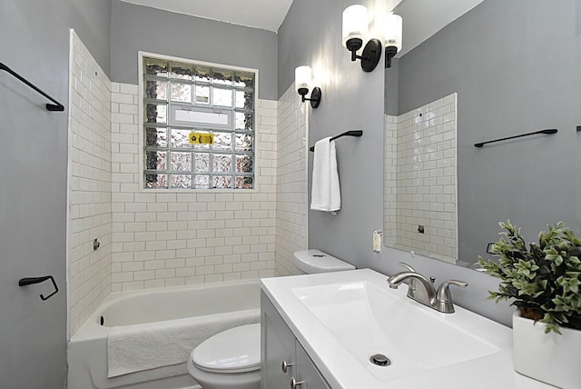 full bath featuring shower / bathing tub combination, toilet, and vanity