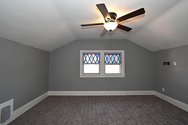 bonus room featuring visible vents, baseboards, lofted ceiling, and carpet floors