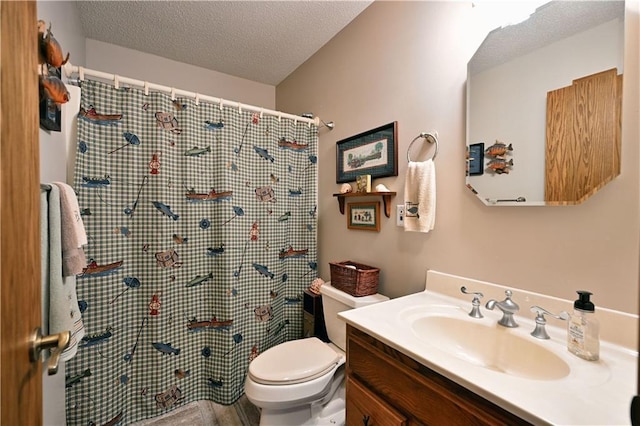 bathroom with a shower with shower curtain, a textured ceiling, vanity, and toilet