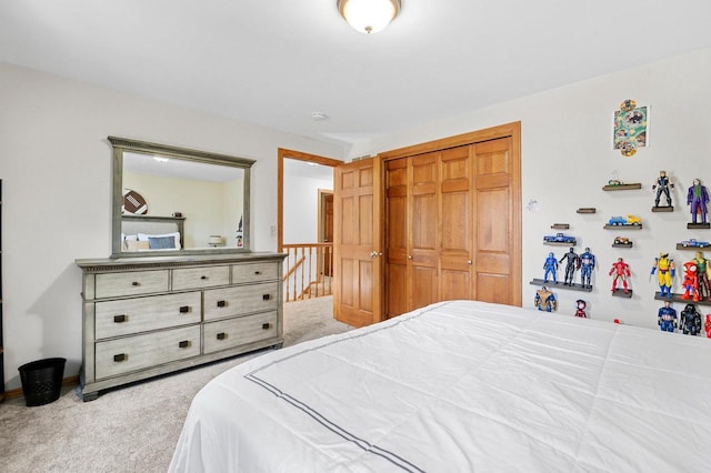 bedroom featuring a closet and carpet floors