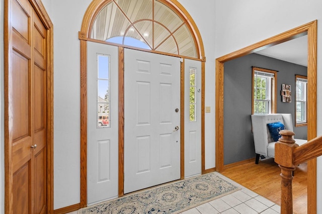 entrance foyer with light tile patterned floors