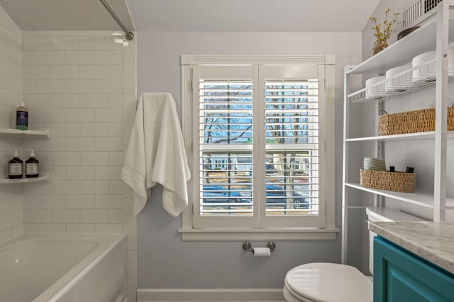 full bathroom with vanity, shower / tub combination, and toilet